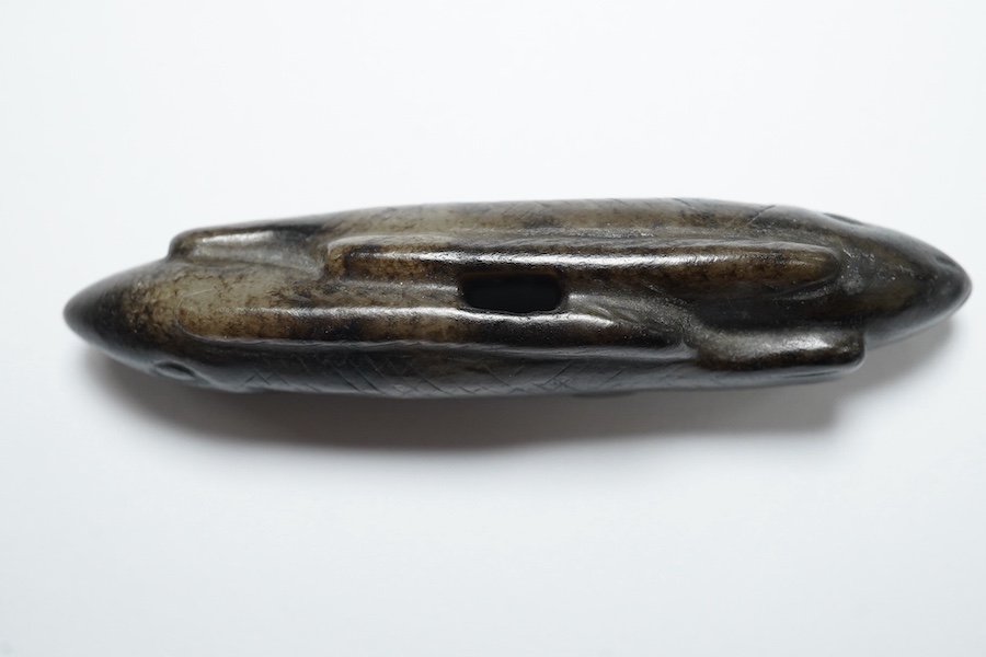 A Chinese black and white jade 'fish' sword fitting, Song or later